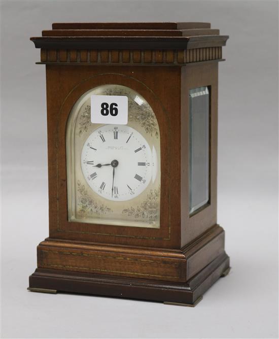 A mahogany mantel clock